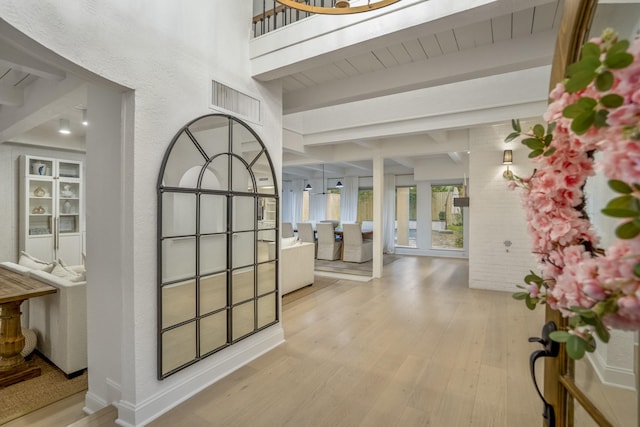 11 Twin Circle Dr, Houston, TX 77042 - corridor with beam ceiling and wood finished floors