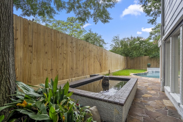 11 Twin Circle Dr, Houston, TX 77042 - fenced backyard featuring a patio area