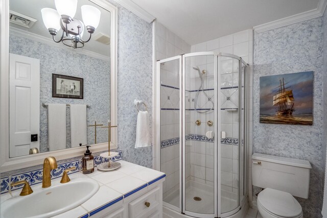 11 Twin Circle Dr, Houston, TX 77042 - full bathroom with vanity, a chandelier, a stall shower, wallpapered walls, and crown molding