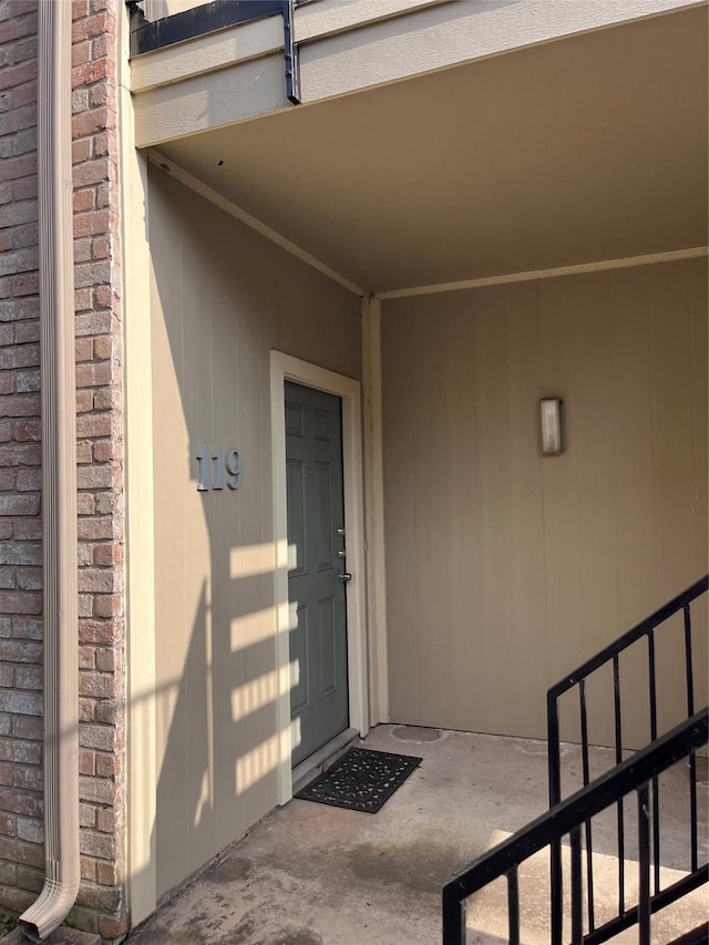 8100 Cambridge St Unit 119, Houston, TX 77054 - entrance to property featuring brick siding