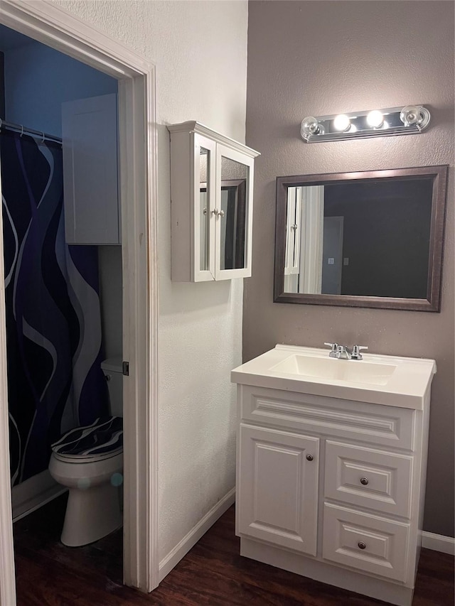 8100 Cambridge St Unit 119, Houston, TX 77054 - full bathroom featuring wood finished floors and vanity