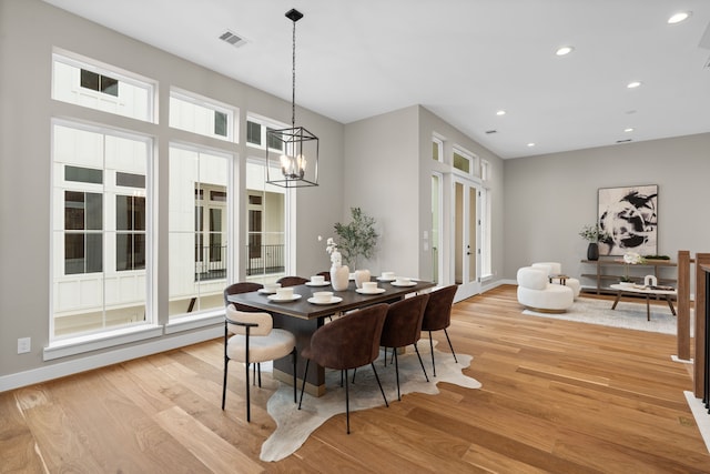 1193 W 19th St, Houston, TX 77008 - dining room with light wood-style floors, recessed lighting, and a chandelier