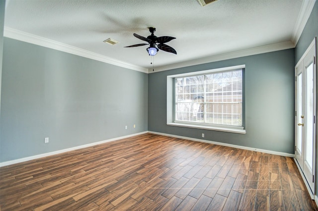 11715 Orchard Mountain Dr, Pasadena, TX 77059 - spare room featuring healthy amount of natural light, dark wood finished floors, a ceiling fan, crown molding, and a textured ceiling