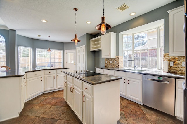 11715 Orchard Mountain Dr, Pasadena, TX 77059 - kitchen featuring dishwasher, black electric stovetop, a kitchen island, healthy amount of natural light, and recessed lighting