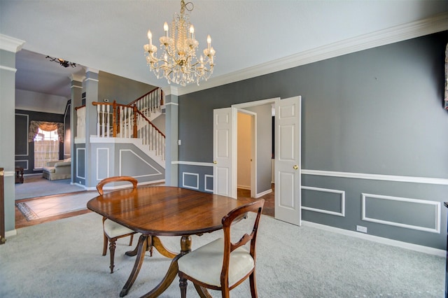 11715 Orchard Mountain Dr, Pasadena, TX 77059 - carpeted dining area with stairway, a chandelier, crown molding, and decorative columns