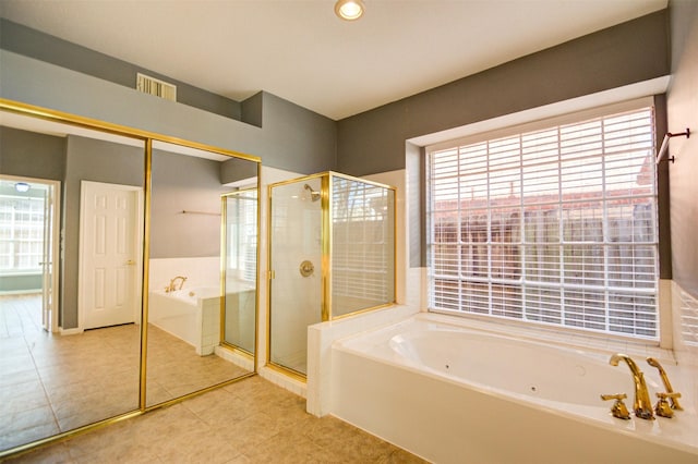 11715 Orchard Mountain Dr, Pasadena, TX 77059 - bathroom with a jetted tub, plenty of natural light, a shower stall, and tile patterned floors