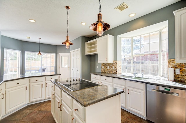 11715 Orchard Mountain Dr, Pasadena, TX 77059 - kitchen featuring dishwasher, black electric cooktop, tasteful backsplash, recessed lighting, and a kitchen island