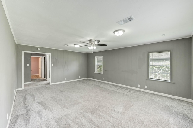 224 Maddox St, Clute, TX 77531 - unfurnished room with carpet flooring, ceiling fan, and ornamental molding