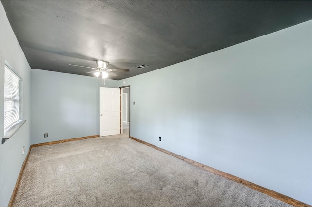 224 Maddox St, Clute, TX 77531 - carpeted empty room featuring baseboards and a ceiling fan