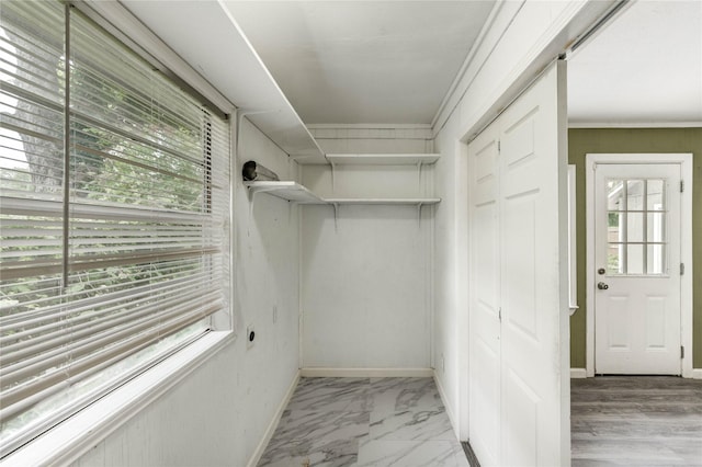224 Maddox St, Clute, TX 77531 - walk in closet featuring light marble finish floors