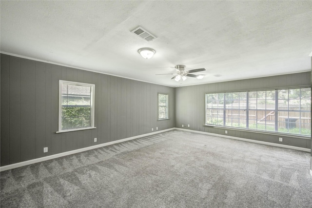 224 Maddox St, Clute, TX 77531 - carpeted spare room featuring a textured ceiling and a ceiling fan