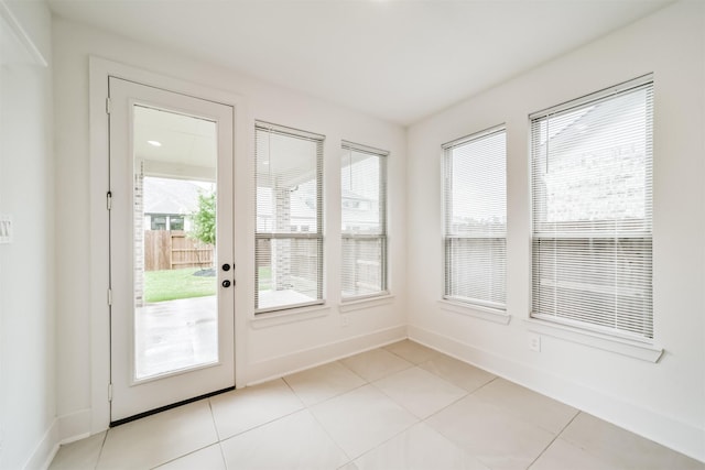 17794 Misty Brook Ln, Conroe, TX 77302 - unfurnished sunroom featuring tile patterned flooring and baseboards