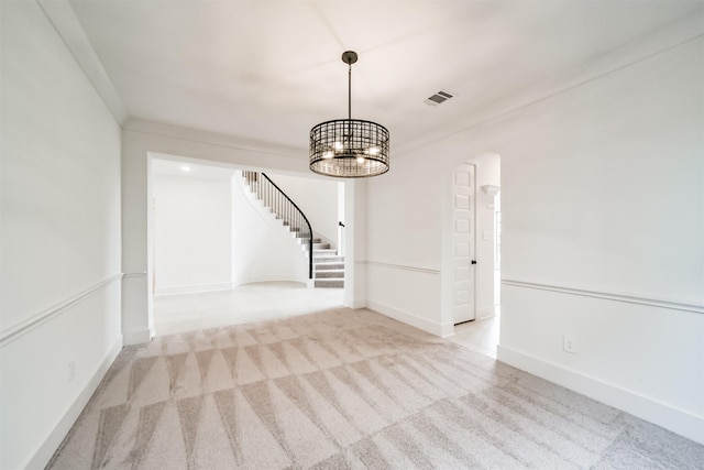 17794 Misty Brook Ln, Conroe, TX 77302 - unfurnished dining area featuring carpet, stairway, a chandelier, and arched walkways