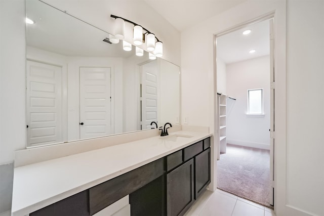 17794 Misty Brook Ln, Conroe, TX 77302 - bathroom with a closet, vanity, tile patterned flooring, and recessed lighting