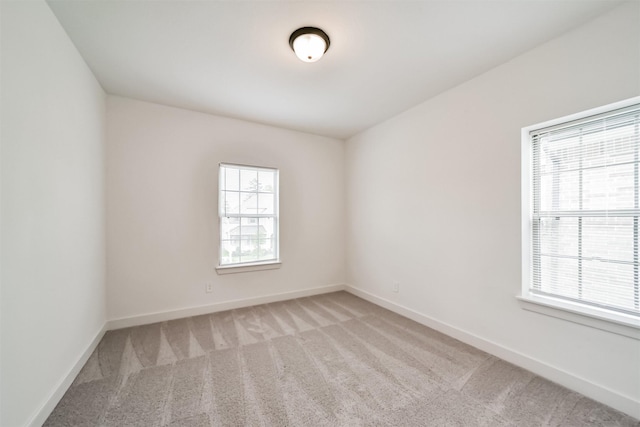 17794 Misty Brook Ln, Conroe, TX 77302 - spare room featuring light carpet and baseboards