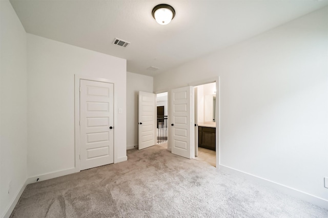 17794 Misty Brook Ln, Conroe, TX 77302 - unfurnished bedroom with light carpet and ensuite bath