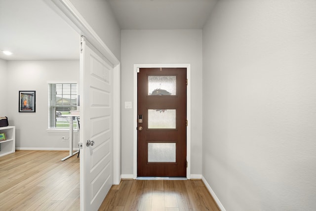2218 Royal Ann Way, Tomball, TX 77375 - entrance foyer featuring light wood-type flooring and baseboards
