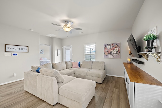 2218 Royal Ann Way, Tomball, TX 77375 - living room with light wood-style floors and ceiling fan
