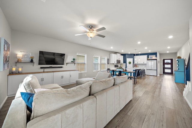 2218 Royal Ann Way, Tomball, TX 77375 - living area featuring recessed lighting, a ceiling fan, and light wood-type flooring