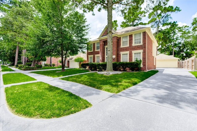 16023 Cutten Rd, Houston, TX 77070 - view of front of property with brick siding and a garage