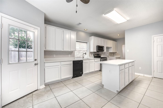 16023 Cutten Rd, Houston, TX 77070 - kitchen featuring appliances with stainless steel finishes, plenty of natural light, a center island, light countertops, and recessed lighting