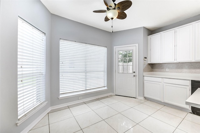 16023 Cutten Rd, Houston, TX 77070 - unfurnished dining area featuring ceiling fan and light tile patterned flooring