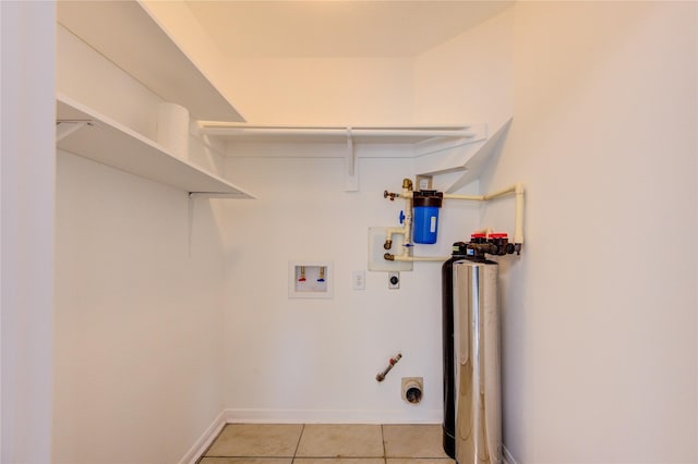 16023 Cutten Rd, Houston, TX 77070 - laundry room with hookup for an electric dryer, washer hookup, and light tile patterned floors