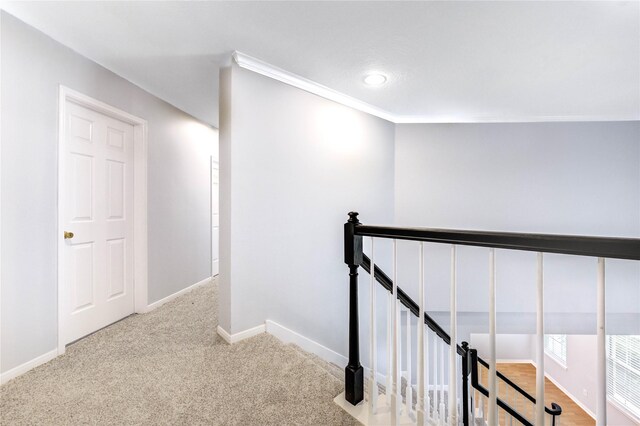 16023 Cutten Rd, Houston, TX 77070 - hall featuring an upstairs landing, carpet flooring, crown molding, and recessed lighting
