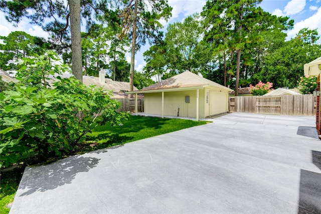 16023 Cutten Rd, Houston, TX 77070 - view of patio / terrace featuring a detached garage