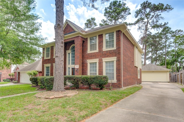 16023 Cutten Rd, Houston, TX 77070 - georgian-style home with brick siding and a detached garage