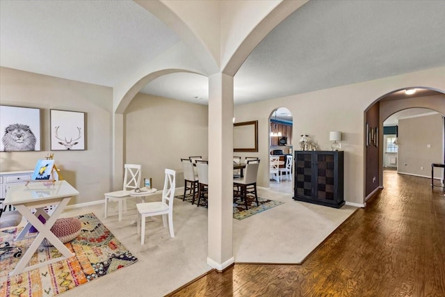 4472 Gerona St, League City, TX 77573 - office area with arched walkways and wood finished floors