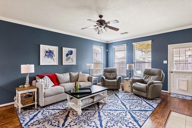 4472 Gerona St, League City, TX 77573 - living area featuring ceiling fan, wood finished floors, ornamental molding, and a textured ceiling