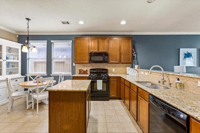 4472 Gerona St, League City, TX 77573 - kitchen featuring black appliances, decorative backsplash, brown cabinetry, light tile patterned floors, and light stone counters