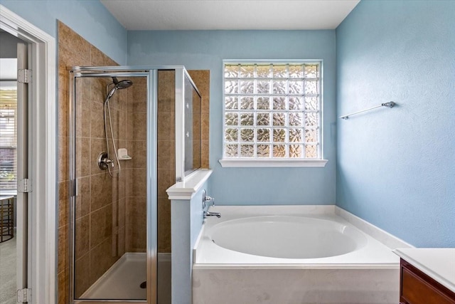 4472 Gerona St, League City, TX 77573 - full bathroom with a bath, a shower stall, and vanity