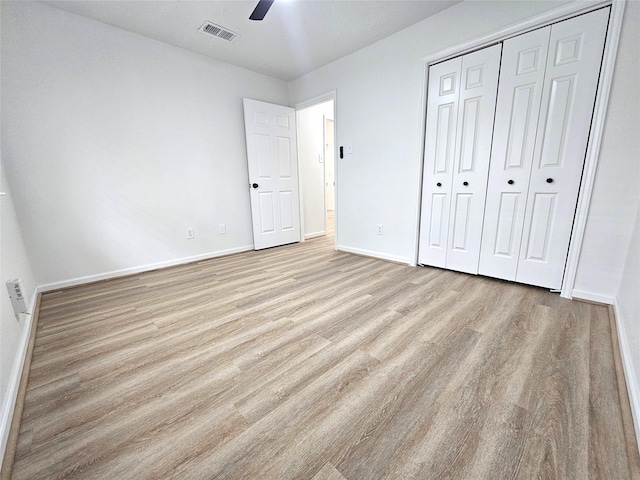 14519 Cypress Valley Dr, Cypress, TX 77429 - unfurnished bedroom with wood finished floors, a closet, and a ceiling fan