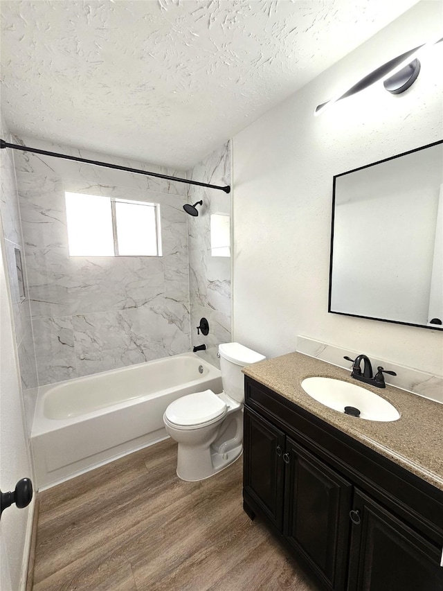 14519 Cypress Valley Dr, Cypress, TX 77429 - full bath featuring bathing tub / shower combination, vanity, wood finished floors, and a textured ceiling