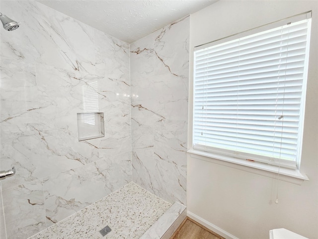 14519 Cypress Valley Dr, Cypress, TX 77429 - bathroom featuring a marble finish shower and wood finished floors
