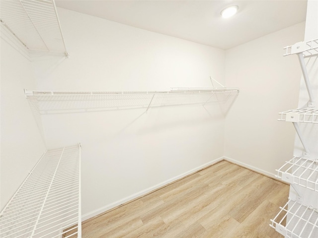 14519 Cypress Valley Dr, Cypress, TX 77429 - walk in closet featuring wood finished floors