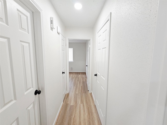 14519 Cypress Valley Dr, Cypress, TX 77429 - hall featuring light wood-style floors and baseboards