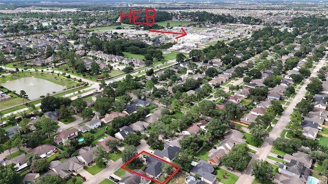 14519 Cypress Valley Dr, Cypress, TX 77429 - aerial view of residential area featuring property parcel outlined and a large body of water