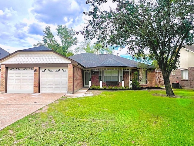 14519 Cypress Valley Dr, Cypress, TX 77429 - single story home featuring a garage, a front yard, driveway, and brick siding