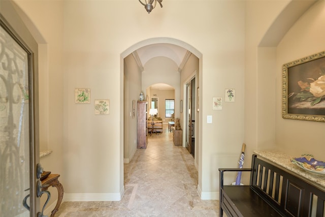 11917 Walden Rd, Montgomery, TX 77356 - hallway featuring arched walkways and baseboards
