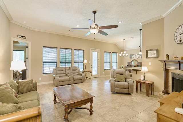 11917 Walden Rd, Montgomery, TX 77356 - living room with ornamental molding, a ceiling fan, a textured ceiling, a chandelier, and a fireplace with raised hearth