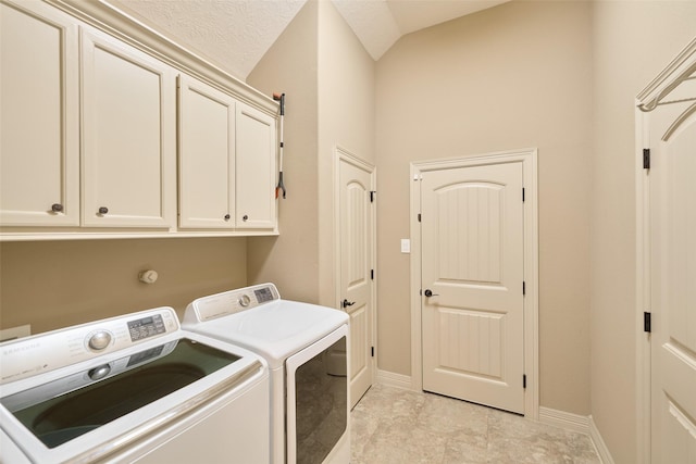 11917 Walden Rd, Montgomery, TX 77356 - laundry room featuring washer and dryer and cabinet space