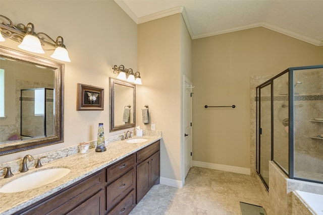 11917 Walden Rd, Montgomery, TX 77356 - bathroom featuring a stall shower, double vanity, vaulted ceiling, and ornamental molding