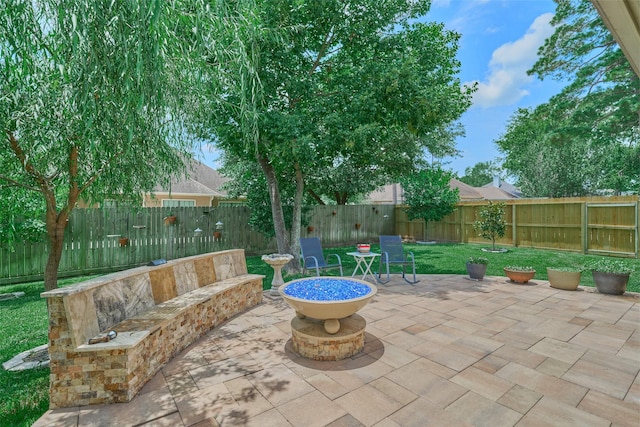 11917 Walden Rd, Montgomery, TX 77356 - fenced backyard featuring a patio area