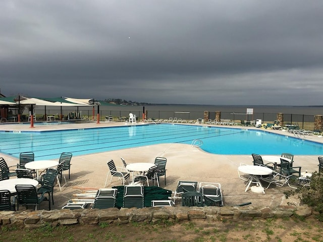 11917 Walden Rd, Montgomery, TX 77356 - community pool featuring a patio