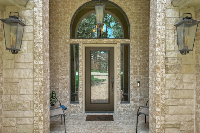 11917 Walden Rd, Montgomery, TX 77356 - view of exterior entry with brick siding