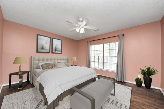 3107 Dulaney Rd, Houston, TX 77084 - bedroom with dark wood-style floors and a ceiling fan