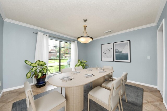 3107 Dulaney Rd, Houston, TX 77084 - dining room with crown molding and a textured ceiling